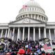 A mob of Trump supporters attempt to stage a coup outside the United States Capitol.